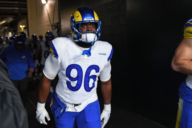 Jan 19, 2025; Philadelphia, Pennsylvania, USA; Los Angeles Rams linebacker Keir Thomas (96) walks to the field against the Philadelphia Eagles in a 2025 NFC divisional round game at Lincoln Financial Field. Mandatory Credit: Eric Hartline-Imagn Images
