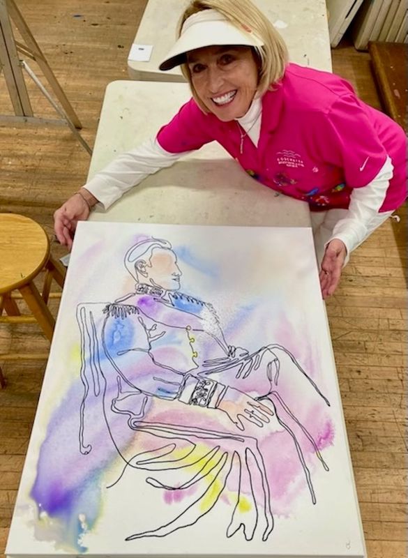 Artist Colleen O’Neill shows off her work at the Desert Art Center.