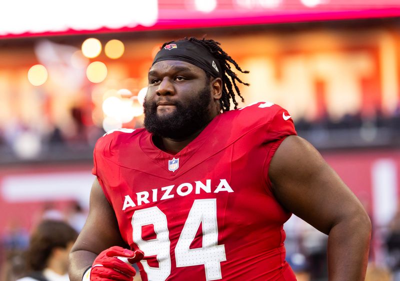 Dec 7, 2025; Glendale, Arizona, USA; Arizona Cardinals defensive lineman Dalvin Tomlinson (94) against the Los Angeles Rams at State Farm Stadium. Mandatory Credit: Mark J. Rebilas-Imagn Images