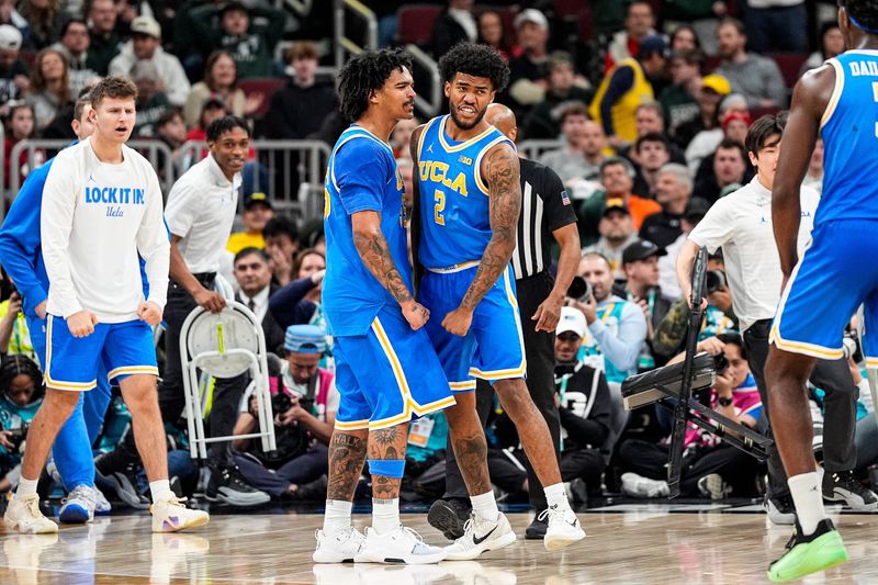 UCLA guard Donovan Dent (2) celebrates a play against Michigan State during the second half of Big Ten tournament quarterfinal at United Center in Chicago on Friday, March 13, 2026.