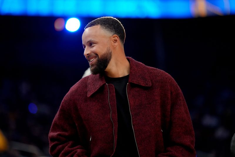 Mar 13, 2026; San Francisco, California, USA; Golden State Warriors guard Stephen Curry (30) stands near the team bench during a timeout against the Minnesota Timberwolves in the first quarter at the Chase Center. Mandatory Credit: Cary Edmondson-Imagn Images
