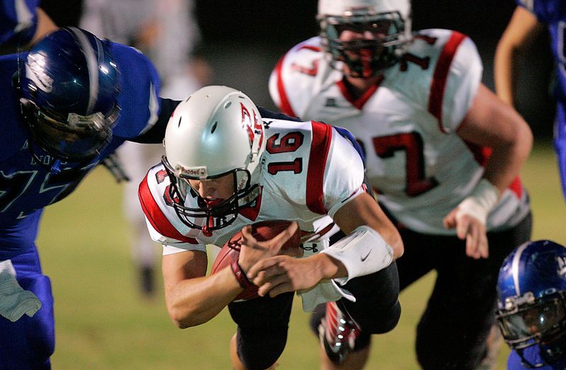 Michael Karls, shown here diving for extra yardage against Cathedral City in 2009, is the new head football coach at Xavier Prep.