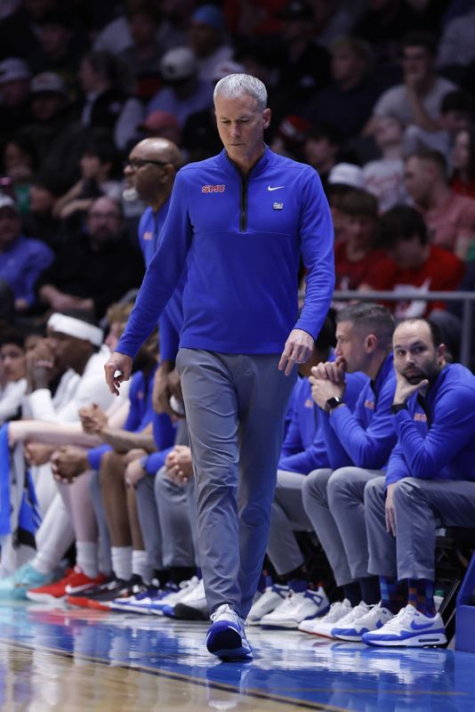 Mar 18, 2026; Dayton, OH, USA; SMU Mustangs head coach Andy Enfield walks the court in the second half against the Miami (OH) RedHawks during a first four game of the men's 2026 NCAA Tournament at University of Dayton Arena. Mandatory Credit: Rick Osentoski-Imagn Images