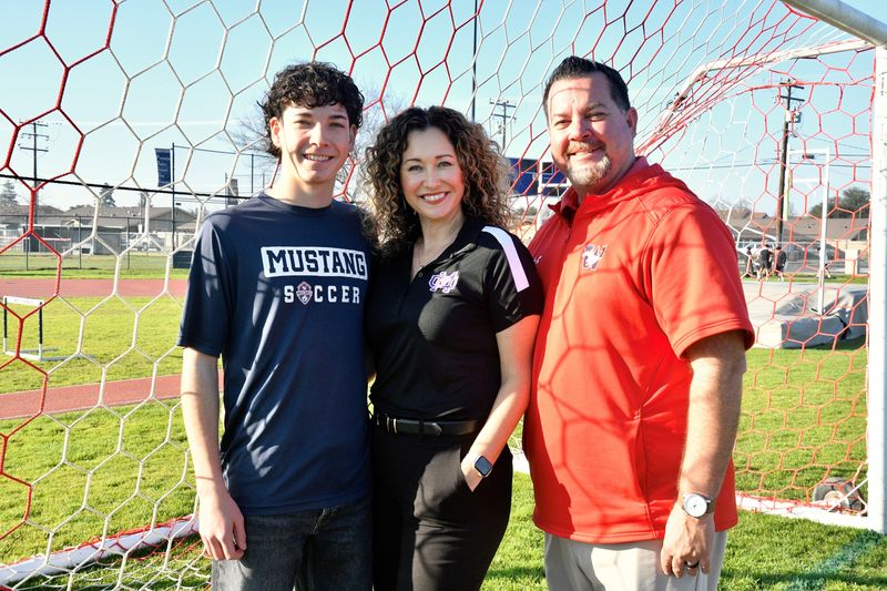 Education and academics lead the way for Tulare's Powell family, pictured left to right, Easton, dad Mike, and mom Wendi. Mike is the athletic director at Tulare Western High School. Wendi is the Mission Oak principal.