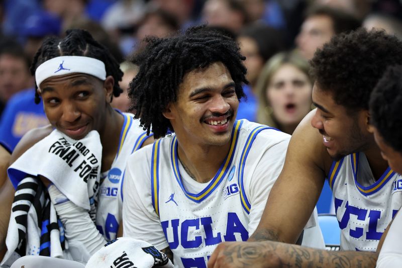 Mar 20, 2026; Philadelphia, PA, USA; UCLA Bruins guard Skyy Clark (55) reacts on the bench in the second half during a first round game of the men's 2026 NCAA Tournament at Xfinity Mobile Arena. Mandatory Credit: Bill Streicher-Imagn Images