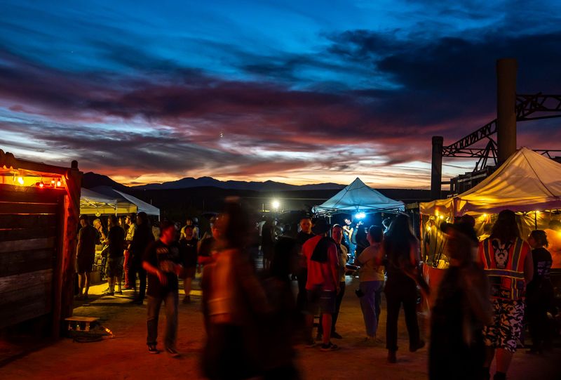 The sun sets on the inaugural Mojave Experience music festival in Joshua Tree, Calif., Saturday, March 21, 2026.