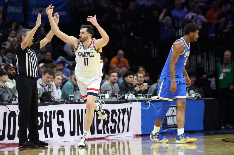 Mar 22, 2026; Philadelphia, PA, USA; UConn Huskies forward Alex Karaban (11) reacts in the second half during a second round game of the men's 2026 NCAA Tournament at Xfinity Mobile Arena. Mandatory Credit: Bill Streicher-Imagn Images