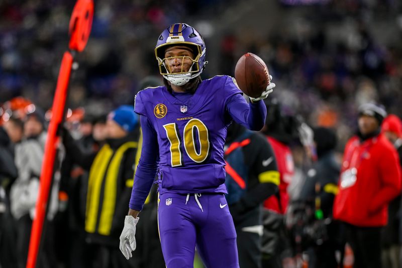 Nov 27, 2025; Baltimore, Maryland, USA; Baltimore Ravens wide receiver Deandre Hopkins (10) reacts after making a reception for a first down during the second half against the Cincinnati Bengals at M&T Bank Stadium. Mandatory Credit: Tommy Gilligan-Imagn Images