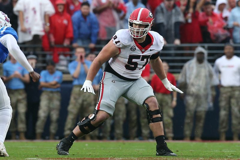 Nov 9, 2024; Oxford, Mississippi, USA; Georgia Bulldogs offensive lineman Monroe Freeling (57) blocks during the first half against the Mississippi Rebels at Vaught-Hemingway Stadium. Mandatory Credit: Petre Thomas-Imagn Images