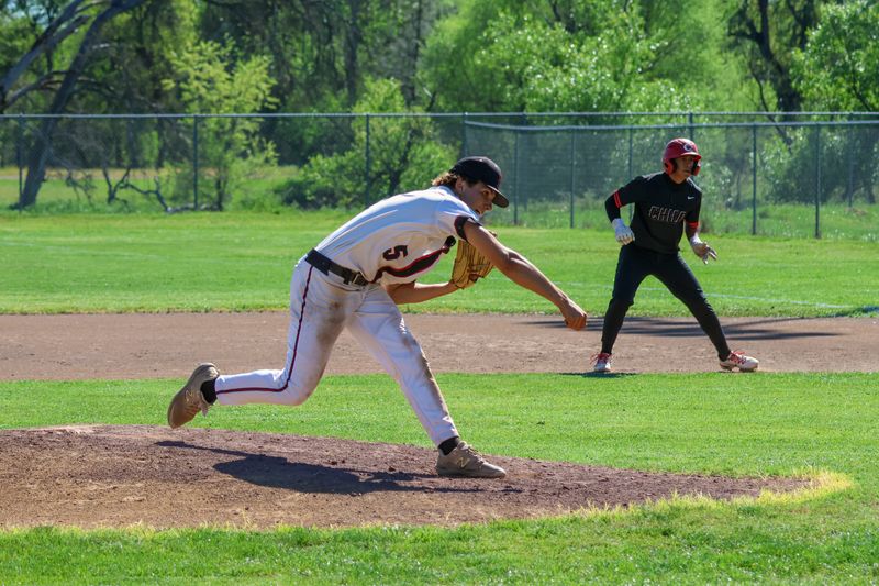 Foothill junior Kayden Williams fires a pitch in a game against Chico. Williams struck out five batters and pitched all seven innings in the Cougars' 5-2 win over Chico in the first game of a doubleheader. March 24, 2026.