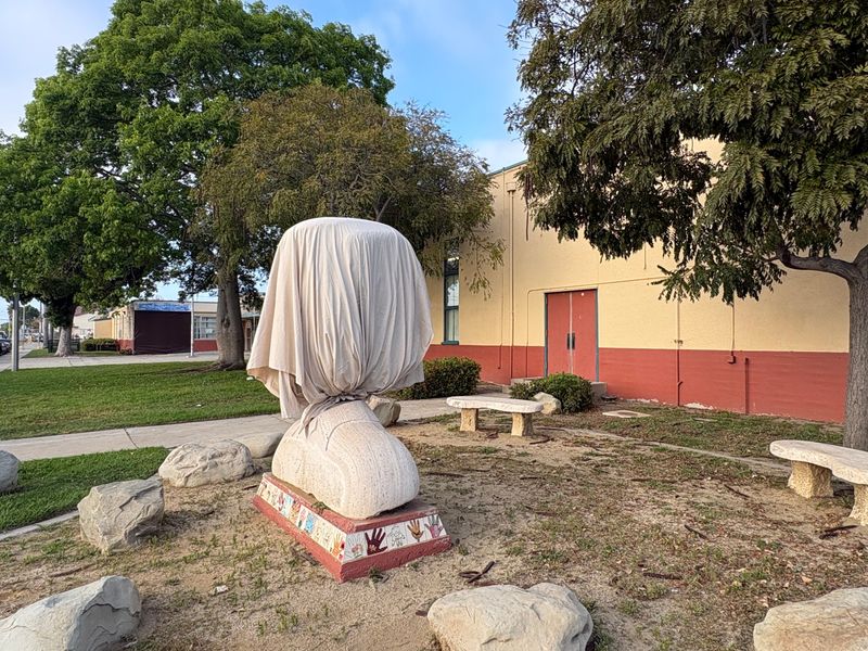 School officials covered a bust of Cesar Chavez at Oxnard school named for the labor leader after accusations came to light that he had sexually abused women and girls.