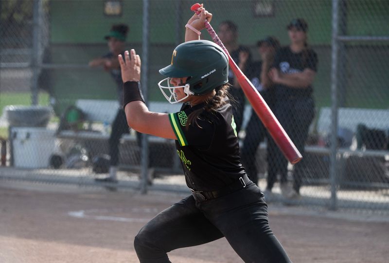 Tracy’s Emalee Cargill hits a single during a varsity softball game against St. Mary’s at the Tracy Softball Complex on Mar. 26, 2026. Tracy won 12-2.