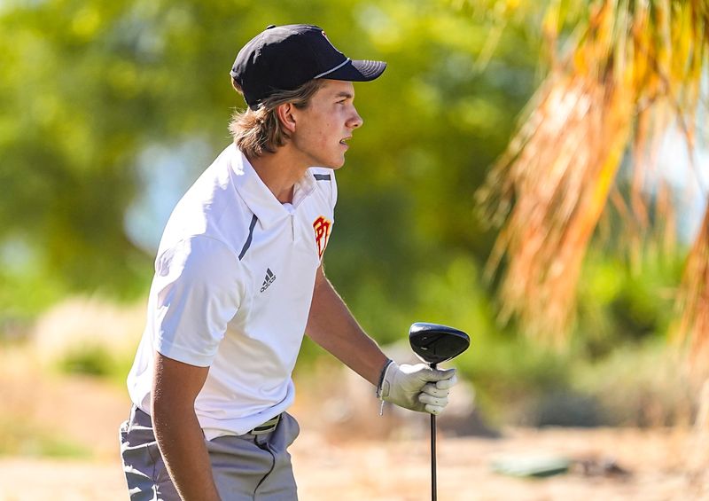 Palm Desert's Cash Tampoles watches his shot after teeing off on one at Desert Willow golf resort in Palm Desert, Calif., Thursday, March 26, 2026.