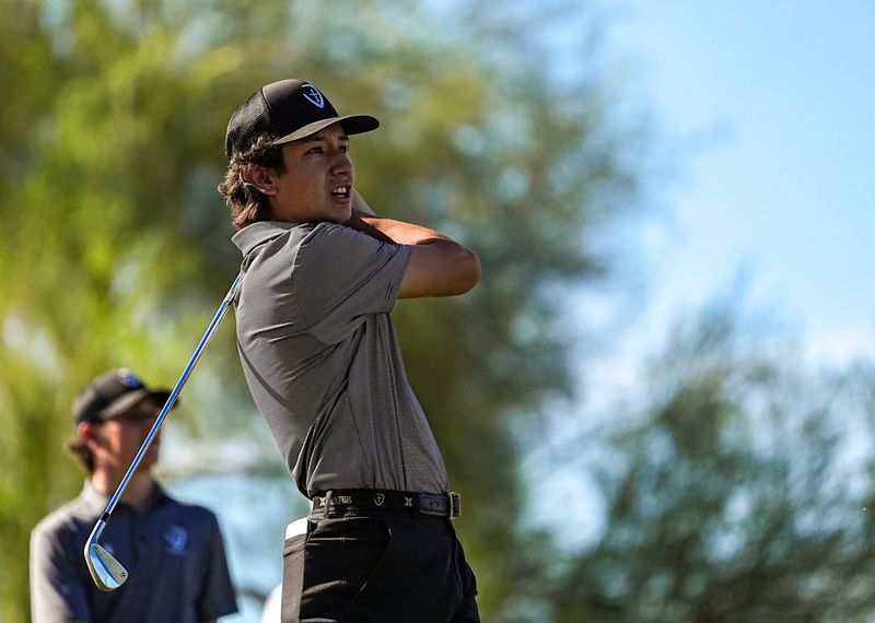 Xavier Prep's Ayden Rosales watches his shot after teeing off on three at Desert Willow golf resort in Palm Desert, Calif., Thursday, March 26, 2026.