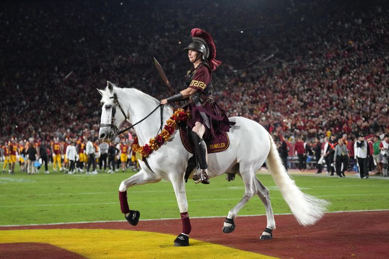 Nov 26, 2022; Los Angeles, California, USA; Southern California Trojans white horse mascot Traveler in the second half against the Notre Dame Fighting Irish at United Airlines Field at Los Angeles Memorial Coliseum. Mandatory Credit: Kirby Lee-USA TODAY Sports
