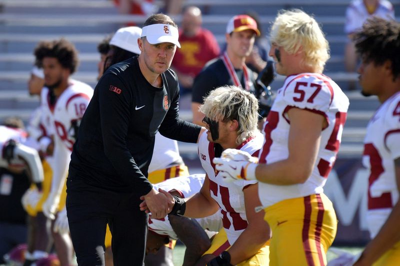 Sep 27, 2025; Champaign, Illinois, USA; Southern California Trojans head coach Lincoln Riley before an NCAA football game with the Illinois Fighting Illini at Memorial Stadium. Mandatory Credit: Ron Johnson-Imagn Images