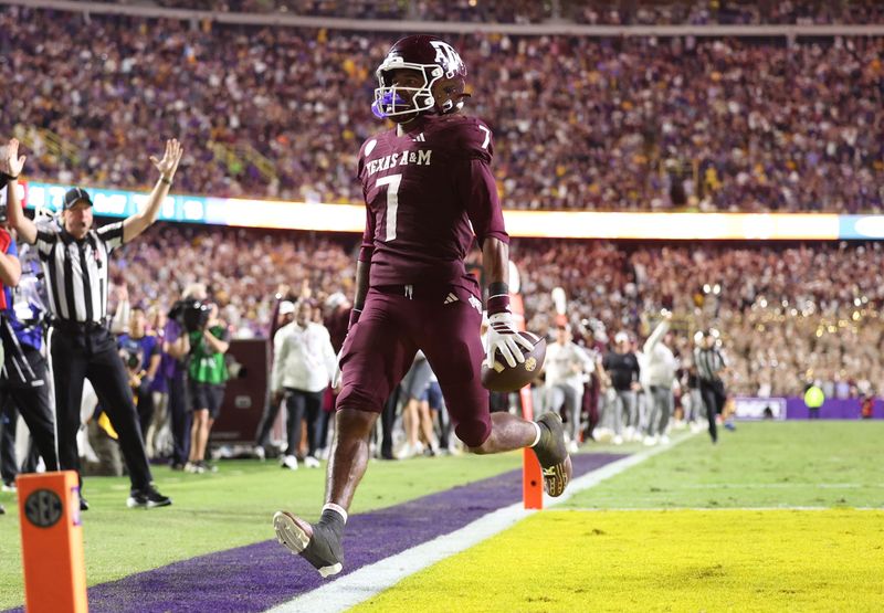 Oct 25, 2025; Baton Rouge, Louisiana, USA; Texas A&M Aggies wide receiver KC Concepcion (7) returns a punt for a touchdown during the second half against the Louisiana State Tigers at Tiger Stadium. Mandatory Credit: Stephen Lew-Imagn Images