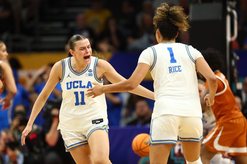 Apr 3, 2026; Phoenix, AZ, USA; UCLA Bruins forward Gabriela Jaquez (11) and guard Kiki Rice (1) react in the second half against the Texas Longhorns during a semifinal of the Final Four of the women's 2026 NCAA Tournament at Mortgage Matchup Center. Mandatory Credit: Mark J. Rebilas-Imagn Images