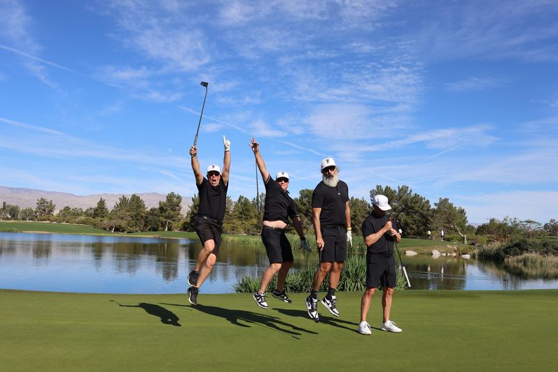 Mike Young, Michael, Shawn Holoubek and Phil Smith III take to the air at the 17th annual Xavier College Preparatory High School golf tournament on Feb. 27, 2026.