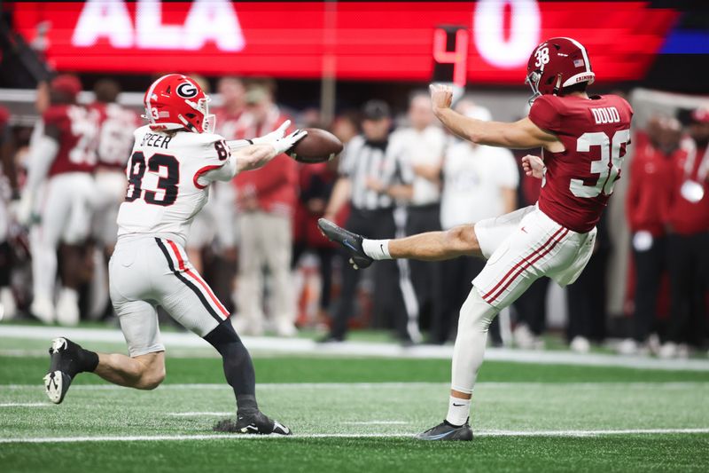 Dec 6, 2025; Atlanta, GA, USA; Georgia Bulldogs wide receiver Cole Speer (83) blocks a punt from Alabama Crimson Tide punter Blake Doud (38) during the first quarter during the 2025 SEC Championship game at Mercedes-Benz Stadium.
