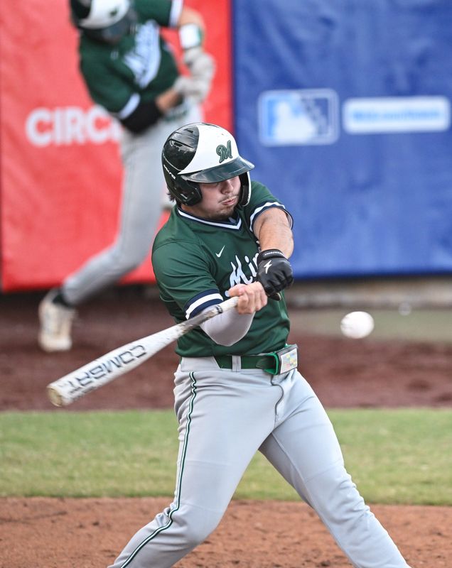 El Diamante's Gauge Rivas bats against Redwood in East Yosemite League high school baseball Wednesday, April 8, 2026.
