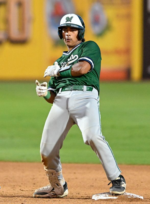 El Diamante's DJ Gonzalez celebrates a double against Redwood in East Yosemite League high school baseball Wednesday, April 8, 2026.