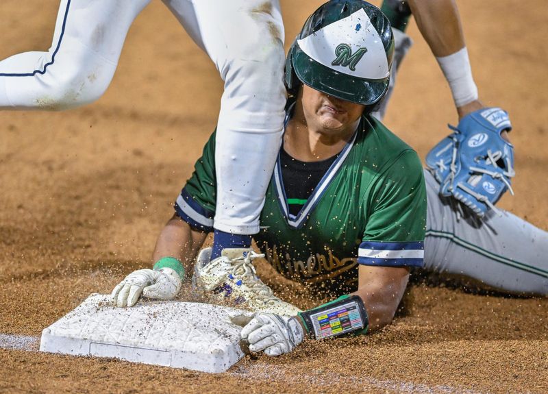 El Diamante's DJ Gonzalez slides into 3rd safely just ahead of the tag from Redwood’s Carson Garcia in East Yosemite League high school baseball Wednesday, April 8, 2026.