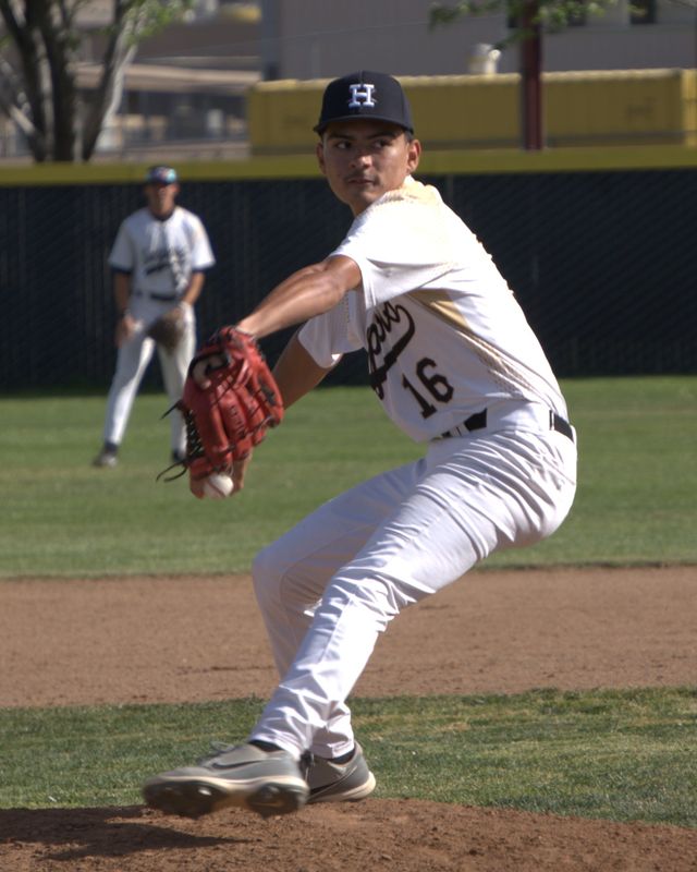 Hesperia's Carlos Ramirez delivers a pitch against Apple Valley on Friday, April 10, 2026. Hesperia beat Apple Valley 5-4 to take a two-game lead for first place in the Mojave River League standings.