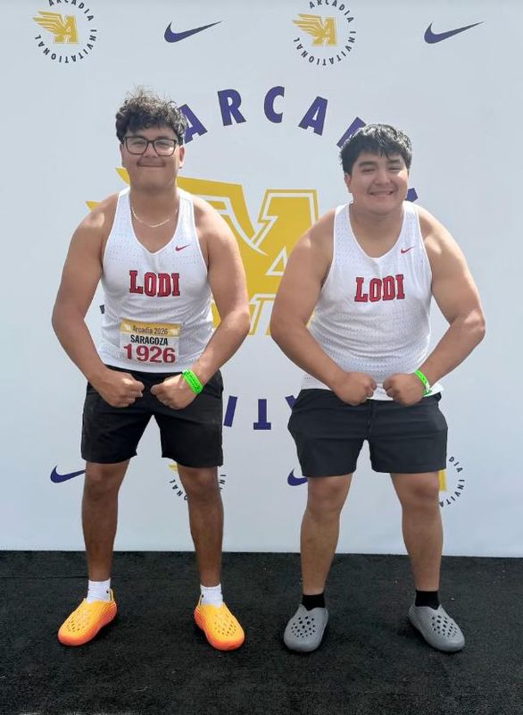 Lodi’s Evan Saragoza, left, and teammate Julian Avila pose at the Arcadia Invitational on April 11 after Saragoza threw 162-10 on his first attempt in the Mens Open Discus division to place sixth, the top mark among Sac-Joaquin Section athletes all outdoor season.