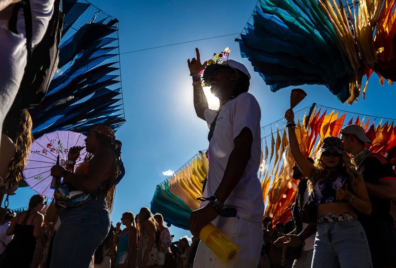 Orlando Hill of Las Vegas dances to Baby J during her set at the Do Lab during Weekend 1 of the Coachella Valley Music and Arts Festival in Indio, Calif., Saturday, April 11, 2026.