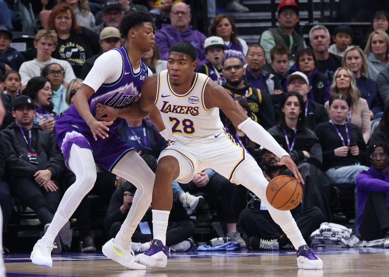 Nov 23, 2025; Salt Lake City, Utah, USA; Los Angeles Lakers forward Rui Hachimura (28) moves toward the basket against Utah Jazz guard Ace Bailey (19) during the fourth quarter at Delta Center. Mandatory Credit: Rob Gray-Imagn Images