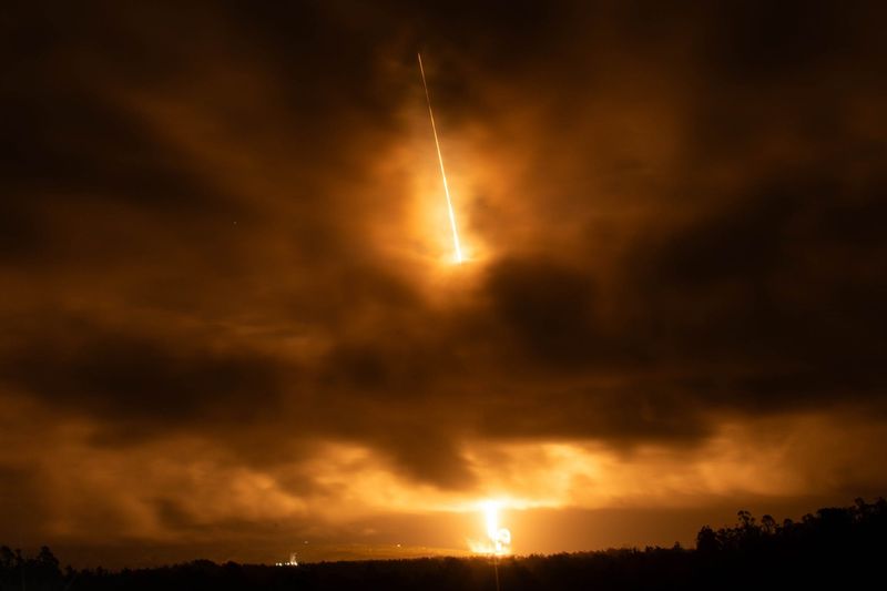 A SpaceX Falcon 9 rocket is seen thundering into the sky April 10 after a launch from the Vandenberg Space Force Base in California.