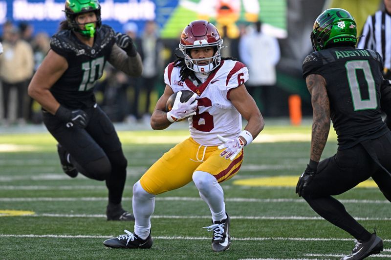 Nov 22, 2025; Eugene, Oregon, USA; Southern California Trojans wide receiver Makai Lemon (6) catches a pass during the first half against the Oregon Ducks at Autzen Stadium. Mandatory Credit: Troy Wayrynen-Imagn Images