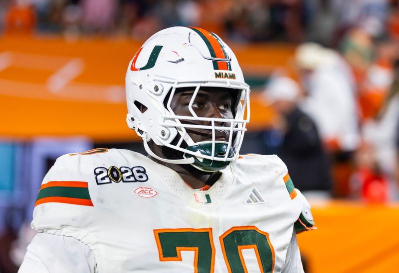Jan 19, 2026; Miami Gardens, FL, USA; Miami Hurricanes offensive lineman Markel Bell (70) against the Indiana Hoosiers during the College Football Playoff National Championship game at Hard Rock Stadium. Mandatory Credit: Mark J. Rebilas-Imagn Images