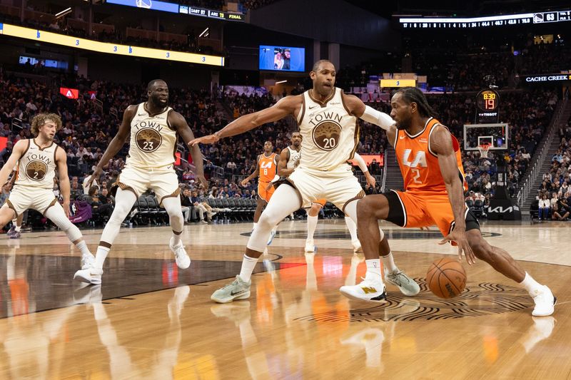 Mar 2, 2026; San Francisco, California, USA; Los Angeles Clippers forward Kawhi Leonard (2) drives around Golden State Warriors center Al Horford (20) during the third quarter at Chase Center. Mandatory Credit: D. Ross Cameron-Imagn Images