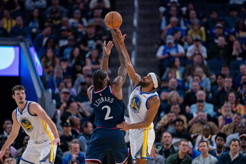 Oct 28, 2025; San Francisco, California, USA; LA Clippers forward Kawhi Leonard (2) shoots the basketball over Golden State Warriors guard Moses Moody (4) during the fourth quarter at Chase Center. Mandatory Credit: Neville E. Guard-Imagn Images