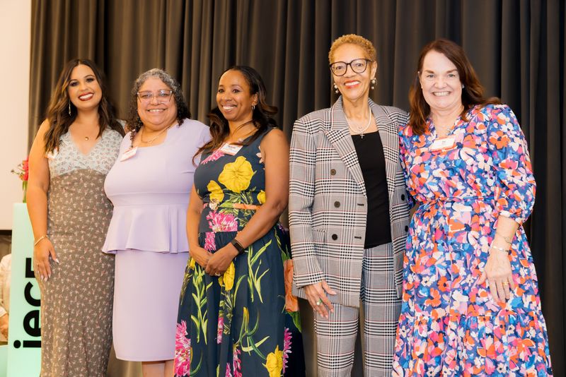 Deanna Alsdorf, Angelina Coe, Adriane Lamar Snider and Pat Bell pose with Women’s Giving Fund committee chair Nefertiti Long (middle) at Spring Fling on March 22, 2026, at Omni Rancho Las Palmas Resort & Spa.