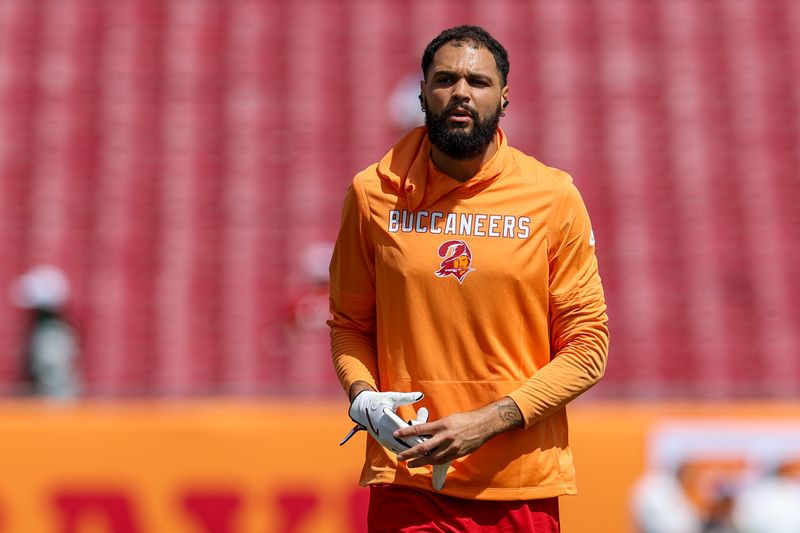 Sep 21, 2025; Tampa, Florida, USA; Tampa Bay Buccaneers wide receiver Mike Evans (13) warms up before a game against the New York Jets at Raymond James Stadium. Mandatory Credit: Nathan Ray Seebeck-Imagn Images