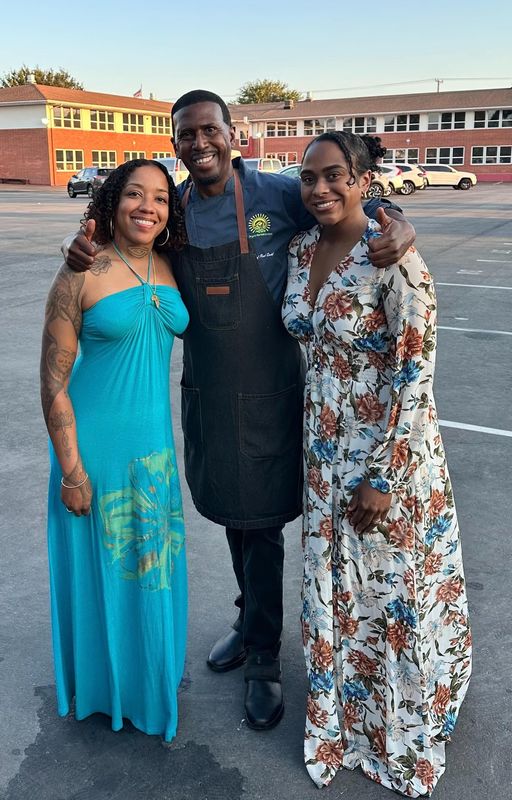 Farmer Tina Marie (left) poses with celebrity chef and farmer Rod Dodd and Soulful Soil Farms board secretary Akera Briscoe.