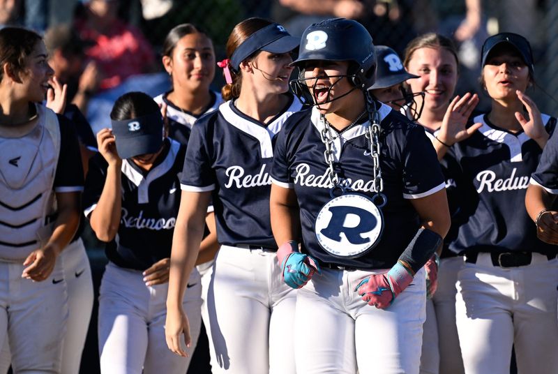 Redwood's Kenzie Cantu celebrates her second home run against Golden West and her 100th hit for the year Tuesday, April 14, 2026.
