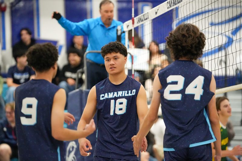 Camarillo outside hitter Stanley Filiaga (18) gets high-fives from teammates after securing a kill in a straight-set victory over visiting Moorpark on Tuesday, April 14, 2026, at Camarillo High.