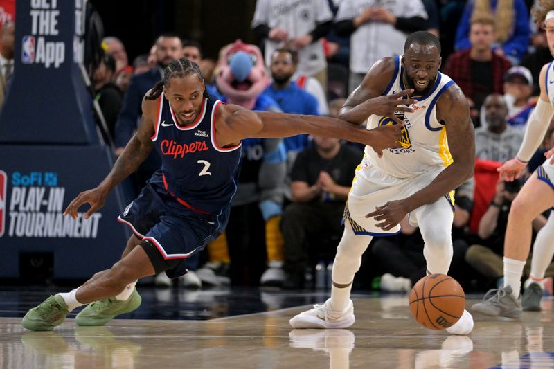Apr 15, 2026; Inglewood, California, USA; Golden State Warriors forward Draymond Green (23) steals the ball from Los Angeles Clippers forward Kawhi Leonard (2) in the final minutes of the game of the play-in rounds of the 2026 NBA Playoffs at Intuit Dome. Mandatory Credit: Jayne Kamin-Oncea-Imagn Images