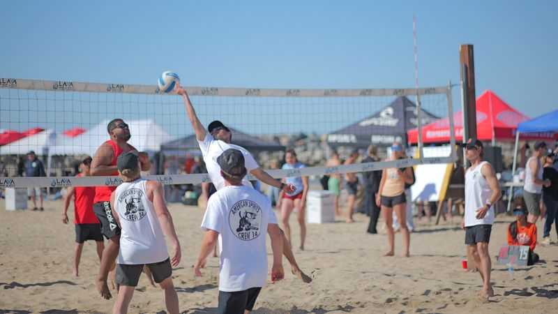 Teams compete in the Hotshot Up tournament in April 2025 at Harbor Cove Beach in Ventura Harbor. Tournament organizers worry about the impact of the planned relocation of the popular volleyball courts after a decision by the California Coastal Commission.