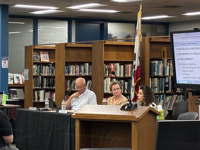 AUHSD Board of Trustees' Joe Gibson (left), Omana Weeks (middle) and Julia Rinauro (right) lead the District's April 15 regular meeting at the Anderson Union High School Library. April 15, 2026.