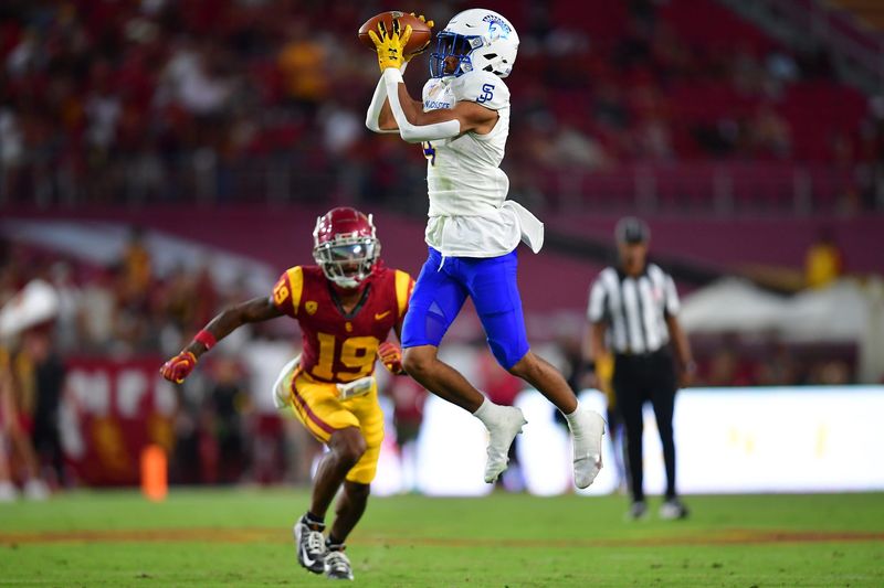 Aug 26, 2023; Los Angeles, California, USA; San Jose State Spartans wide receiver Charles Ross (4) catches a pass against the Southern California Trojans during the second half at Los Angeles Memorial Coliseum. Mandatory Credit: Gary A. Vasquez-USA TODAY Sports