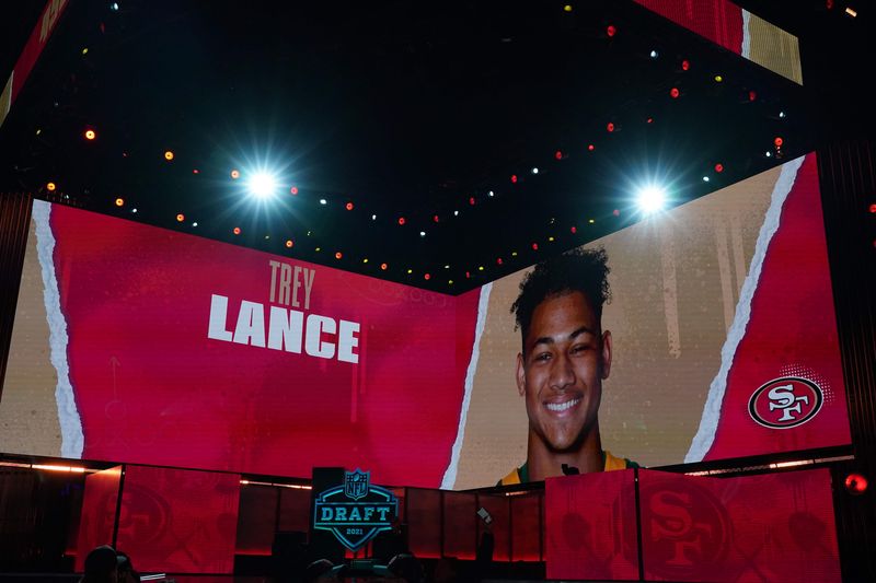 Apr 29, 2021; Cleveland, Ohio, USA; North Dakota State Bisons quarterback Trey Lance is displayed on the video board after being selected as the third pick by the San Francisco 49ers during the 2021 NFL Draft at First Energy Stadium. Mandatory Credit: Kirby Lee-USA TODAY Sports