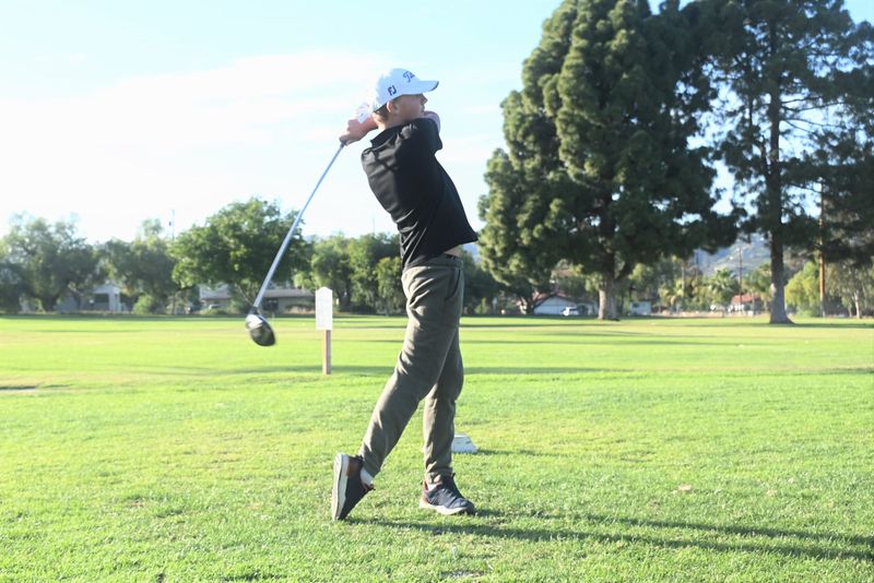 Magnus Kalins, 14-year-old cancer survivor, hits a drive at Saticoy Regional Golf Course in Ventura on April 15.