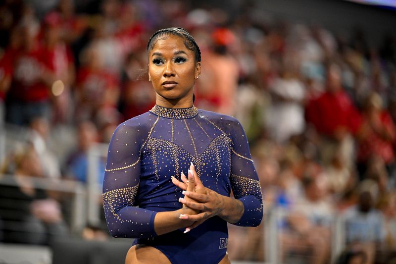 Apr 16, 2026; Fort Worth, TX, USA; UCLA gymnast Jordan Chiles looks on during semifinals for the 2026 NCAA Women’s Gymnastics National Championships at Dickies Arena. Mandatory Credit: Jerome Miron-Imagn Images