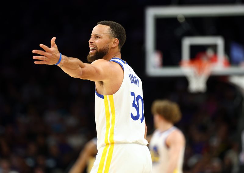 Apr 17, 2026; Phoenix, Arizona, USA; Golden State Warriors guard Stephen Curry (30) reacts against the Phoenix Suns during the second half in the play-in rounds of the 2026 NBA Playoffs at Mortgage Matchup Center. Mandatory Credit: Mark J. Rebilas-Imagn Images