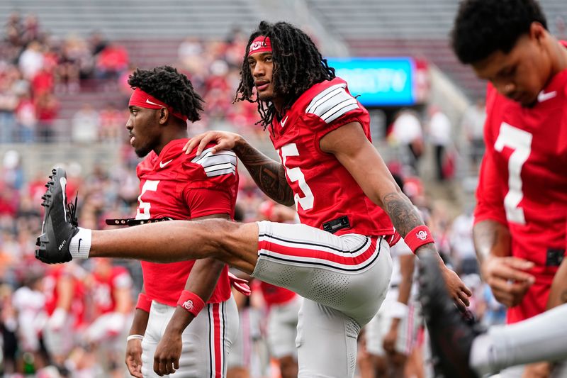 Wide receiver Chris Henry Jr. (15) warms up during the Ohio State football spring game at Ohio Stadium in Columbus on April 18, 2026.